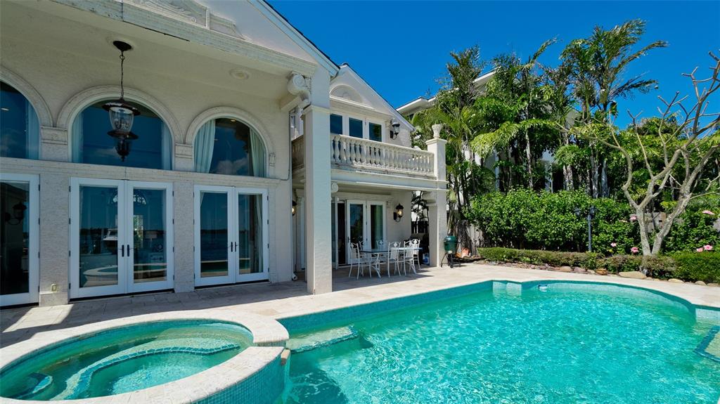 8213 Midnight Pass Road Sarasota, FL 34242 - Photo 45 of 52 front view of a house with a yard