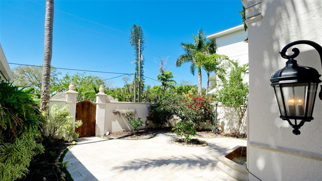 8213 Midnight Pass Road Sarasota, FL 34242 - Photo 6 of 52 a view of a entryway in front of house
