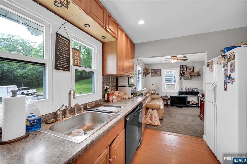 3 Riverside Road West Milford, NJ 07421 - Photo 17 of 29 a kitchen with a large window and a sink