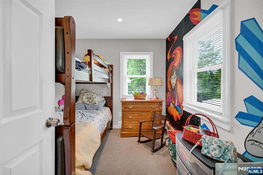 3 Riverside Road West Milford, NJ 07421 - Photo 20 of 29 a bedroom with furniture and a large window