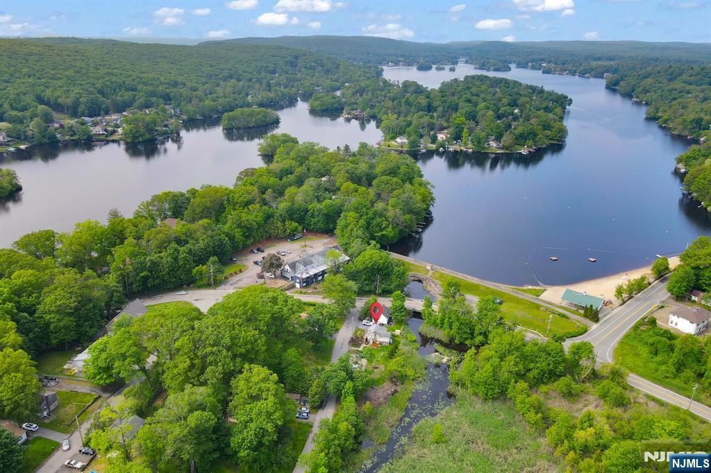 3 Riverside Road West Milford, NJ 07421 - Photo 27 of 29 an aerial view of lake residential house with swimming pool and outdoor space