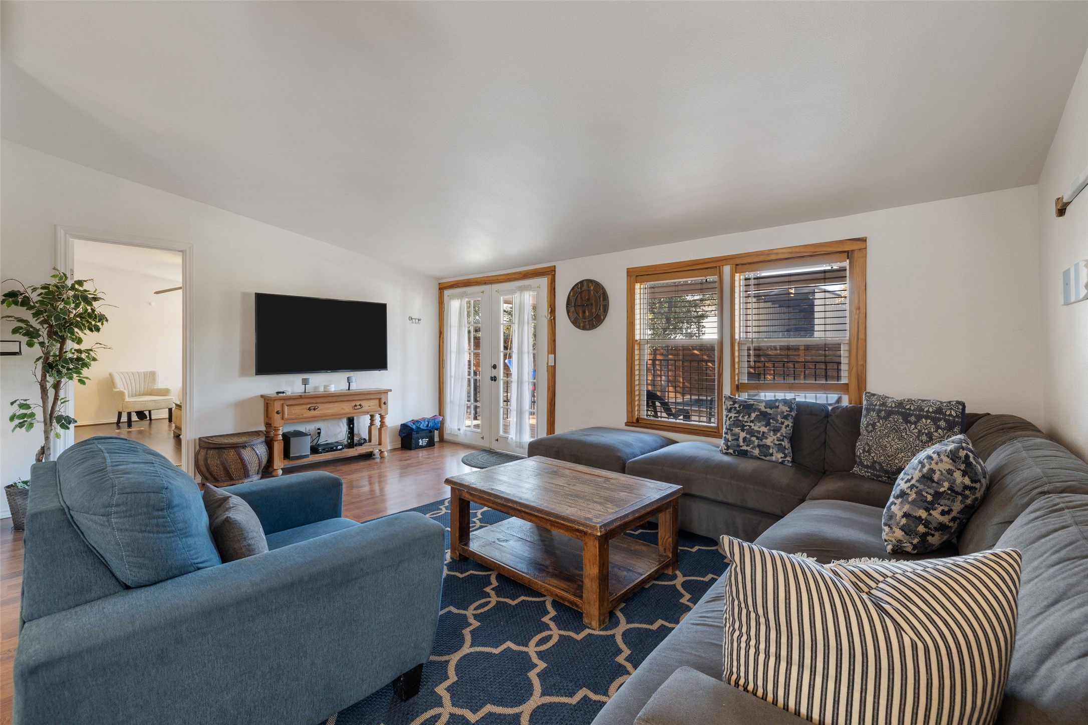 5519 Hiline Road Austin, TX 78734 - Photo 13 of 40 a living room with furniture and a flat screen tv