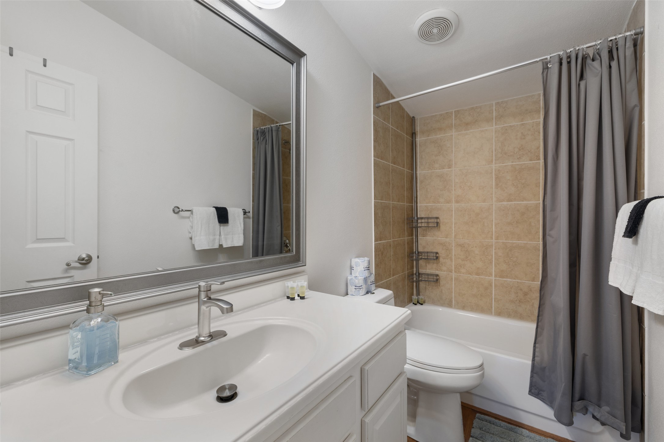 5519 Hiline Road Austin, TX 78734 - Photo 22 of 40 a bathroom with a sink a toilet and shower