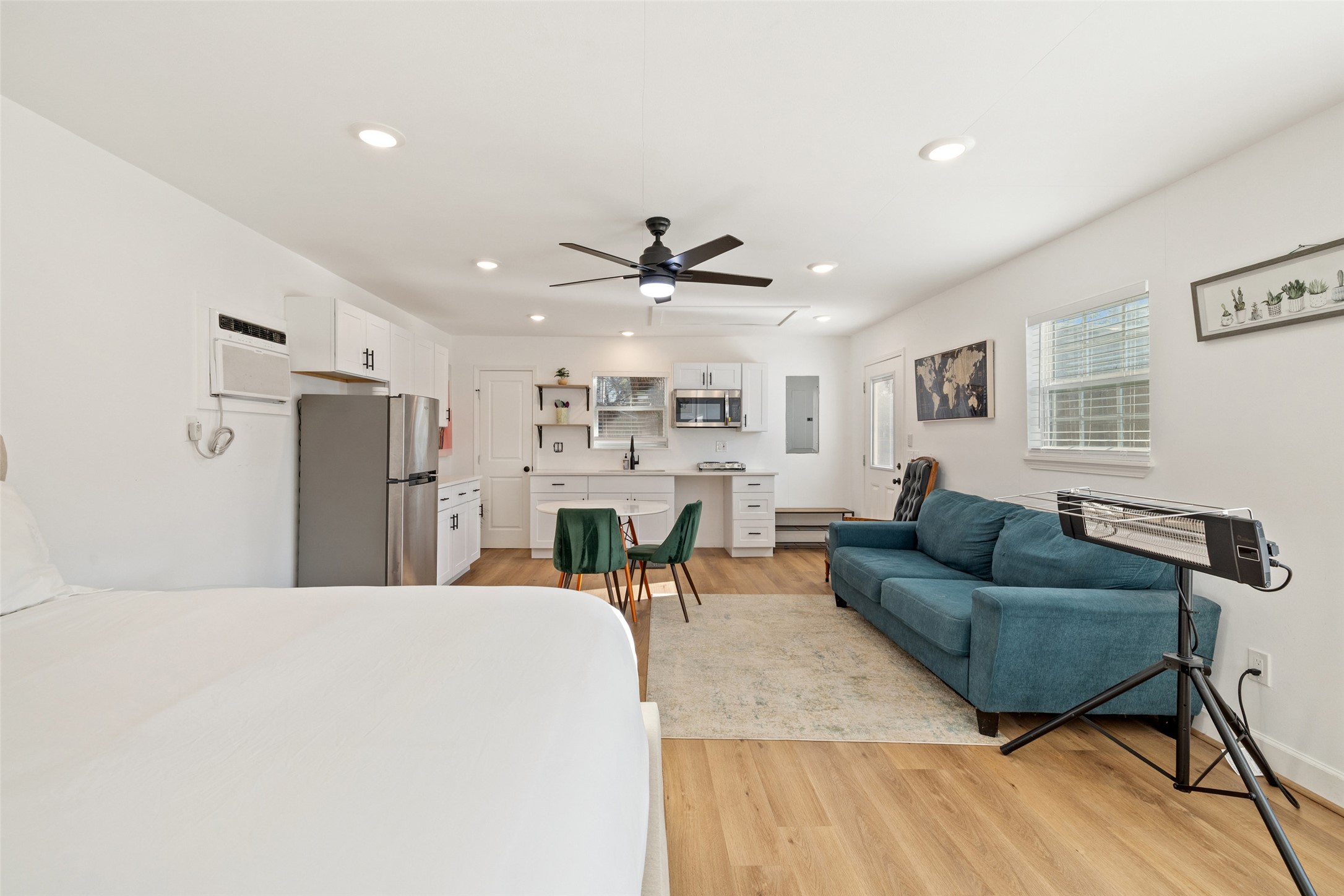 5519 Hiline Road Austin, TX 78734 - Photo 33 of 40 a living room with furniture and a wooden floor