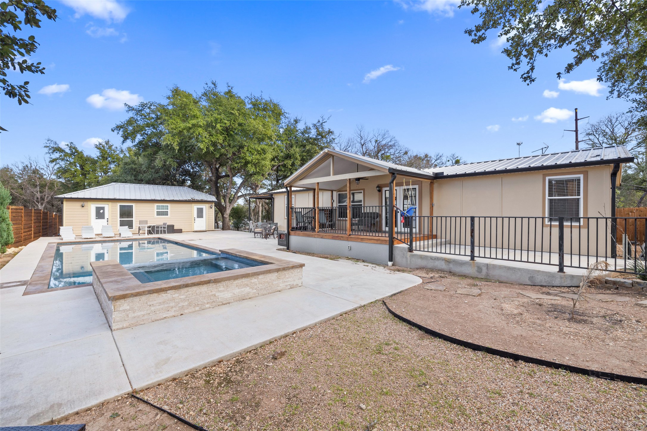 5519 Hiline Road Austin, TX 78734 - Photo 35 of 40 a view of a house with a patio