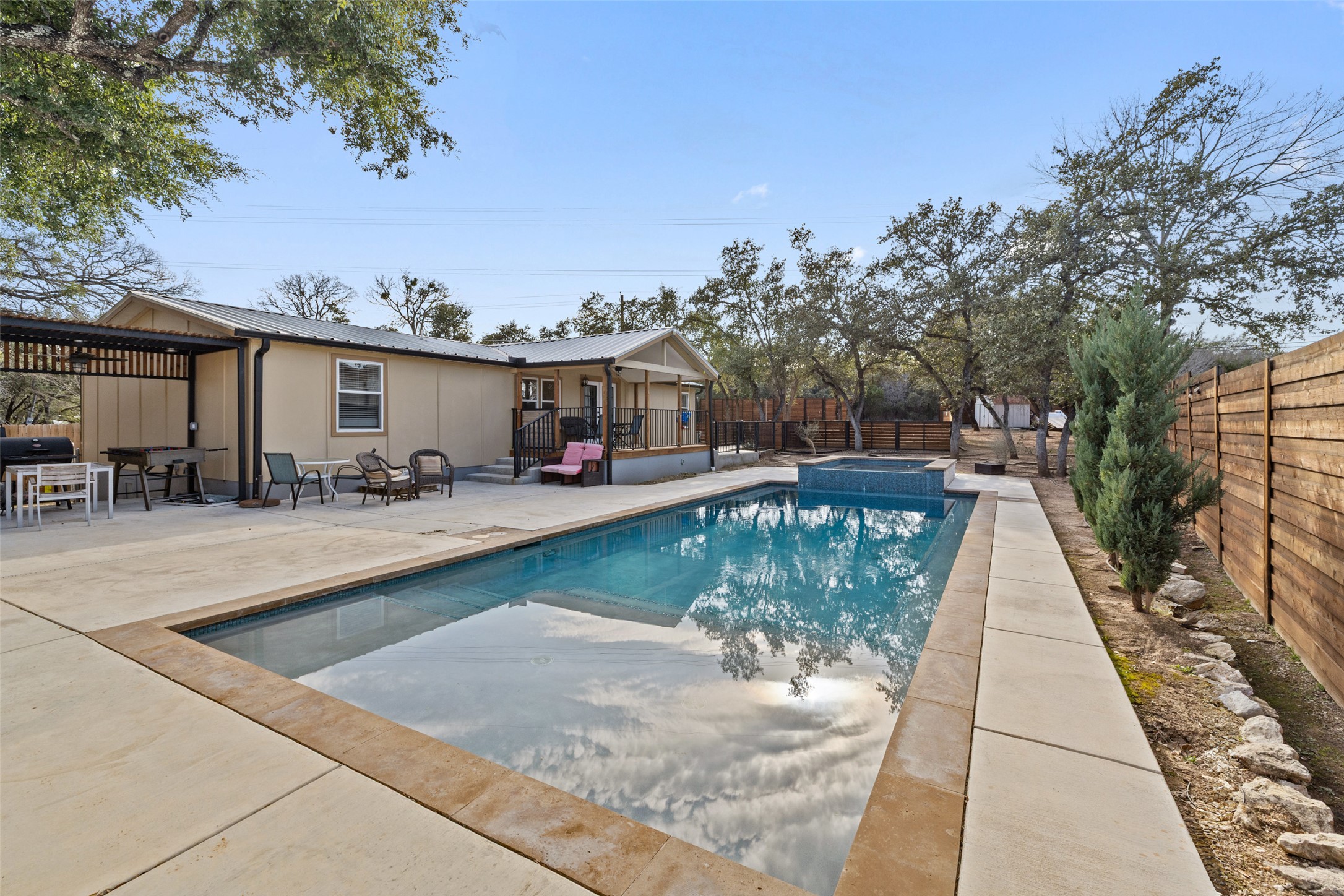 5519 Hiline Road Austin, TX 78734 - Photo 38 of 40 a view of a swimming pool with a patio