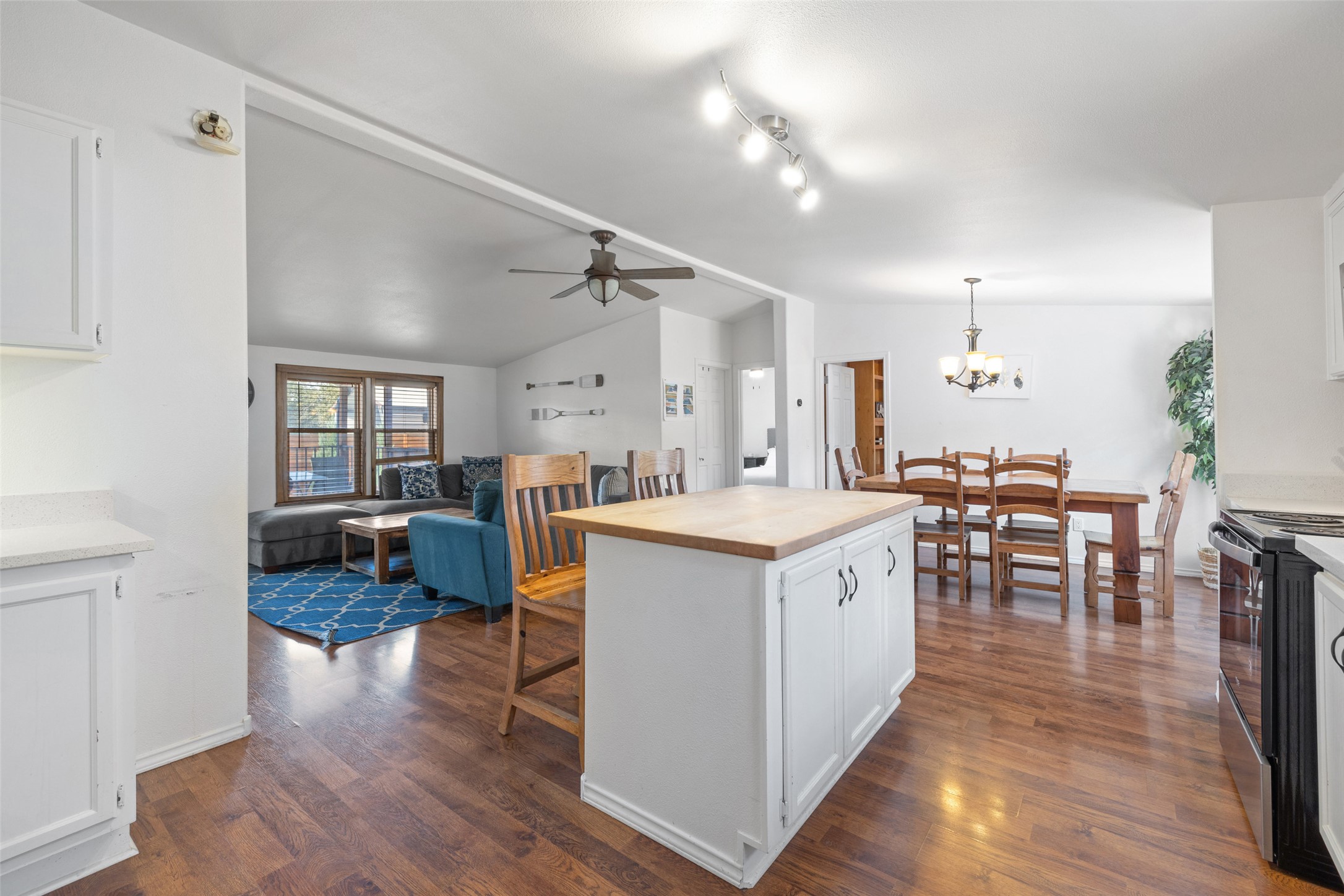 5519 Hiline Road Austin, TX 78734 - Photo 9 of 40 a large kitchen with sink a counter space and stainless steel appliances