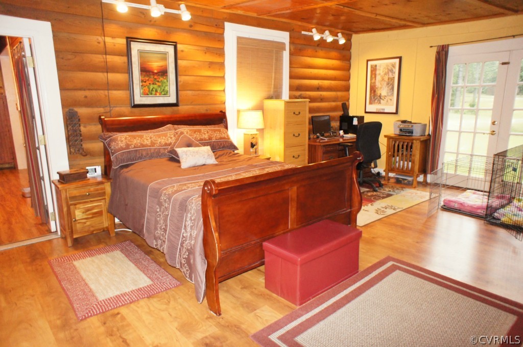 11250 Taylor Road Chesterfield, VA 23838 - Photo 12 of 24 a bed room with a bed and glass door