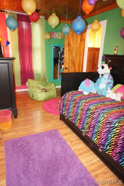 11250 Taylor Road Chesterfield, VA 23838 - Photo 17 of 24 a bedroom with a bed and a lamp