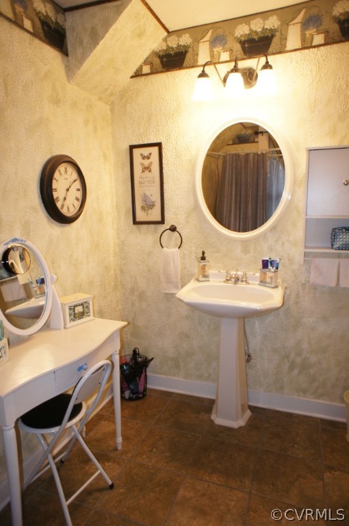 11250 Taylor Road Chesterfield, VA 23838 - Photo 19 of 24 a bathroom with a sink a mirror and a toilet