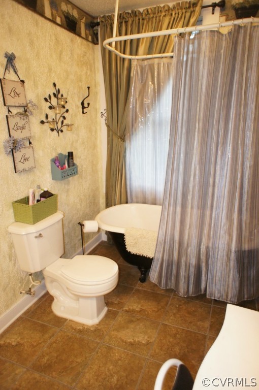 11250 Taylor Road Chesterfield, VA 23838 - Photo 20 of 24 a bathroom with a toilet and shower