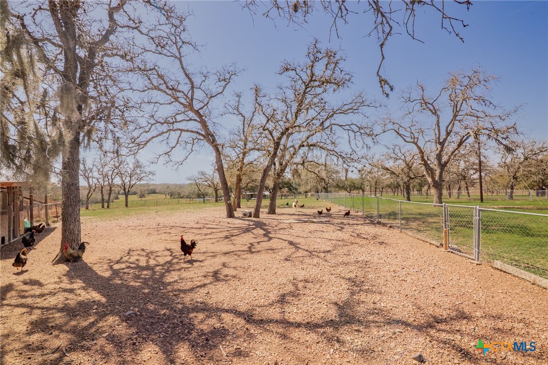 455 Suncrest Lane Victoria, TX 77905 - Photo 15 of 39 a view of house with yard covered in snow