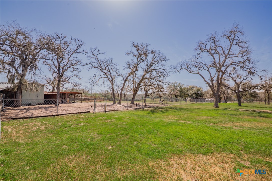 455 Suncrest Lane Victoria, TX 77905 - Photo 17 of 39 a view of a lake with houses