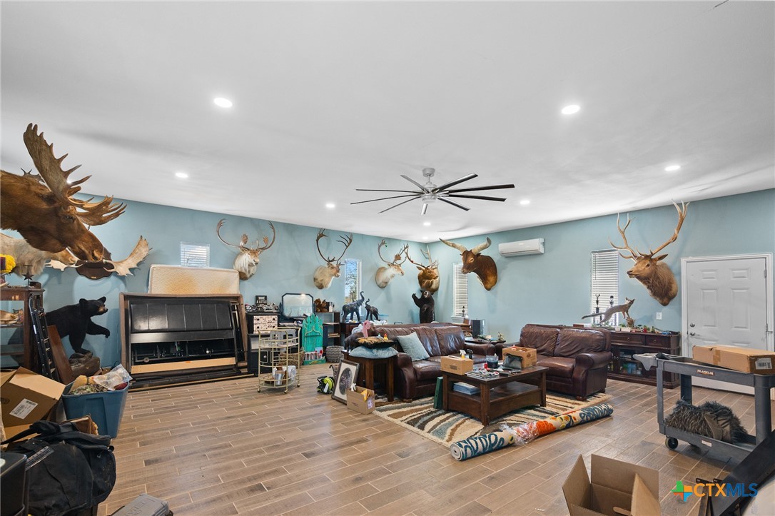 455 Suncrest Lane Victoria, TX 77905 - Photo 22 of 39 a living room with furniture and a fireplace
