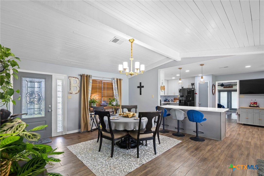 455 Suncrest Lane Victoria, TX 77905 - Photo 32 of 39 a view of a dining room with furniture window and wooden floor