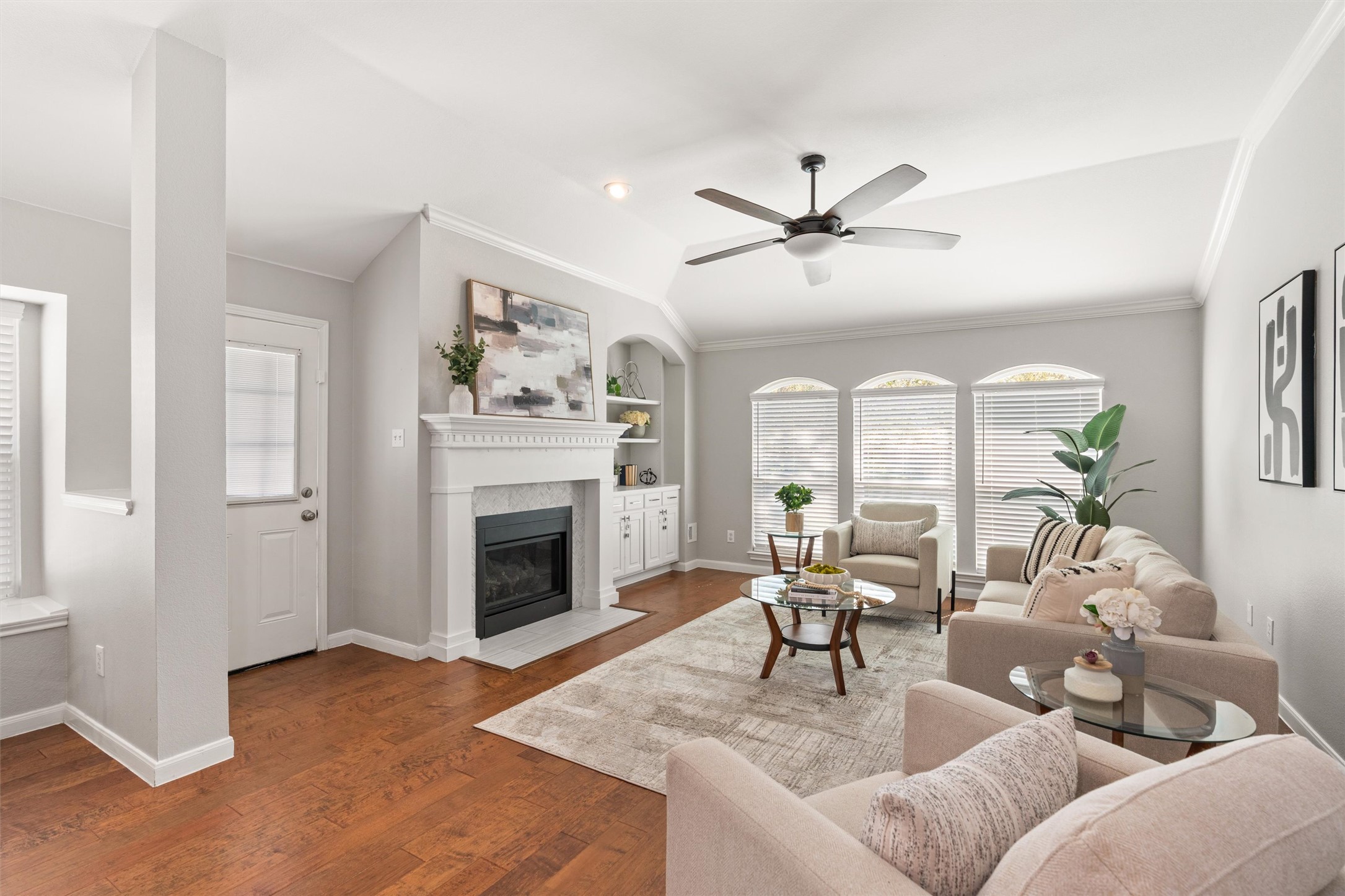 129 Summers Green Georgetown, TX 78633 - Photo 14 of 30 a living room with furniture a fireplace and a chandelier