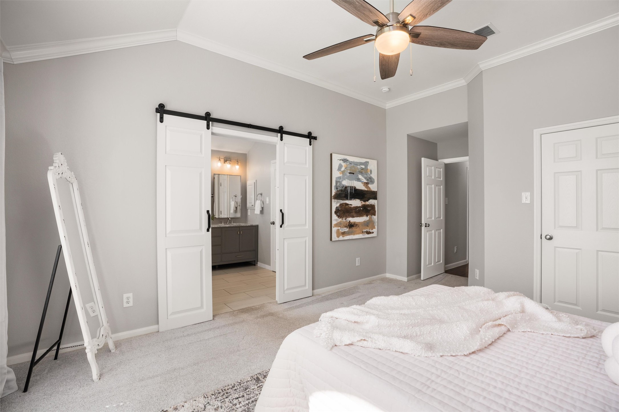 129 Summers Green Georgetown, TX 78633 - Photo 18 of 30 a bedroom with a bed and a walk in closet