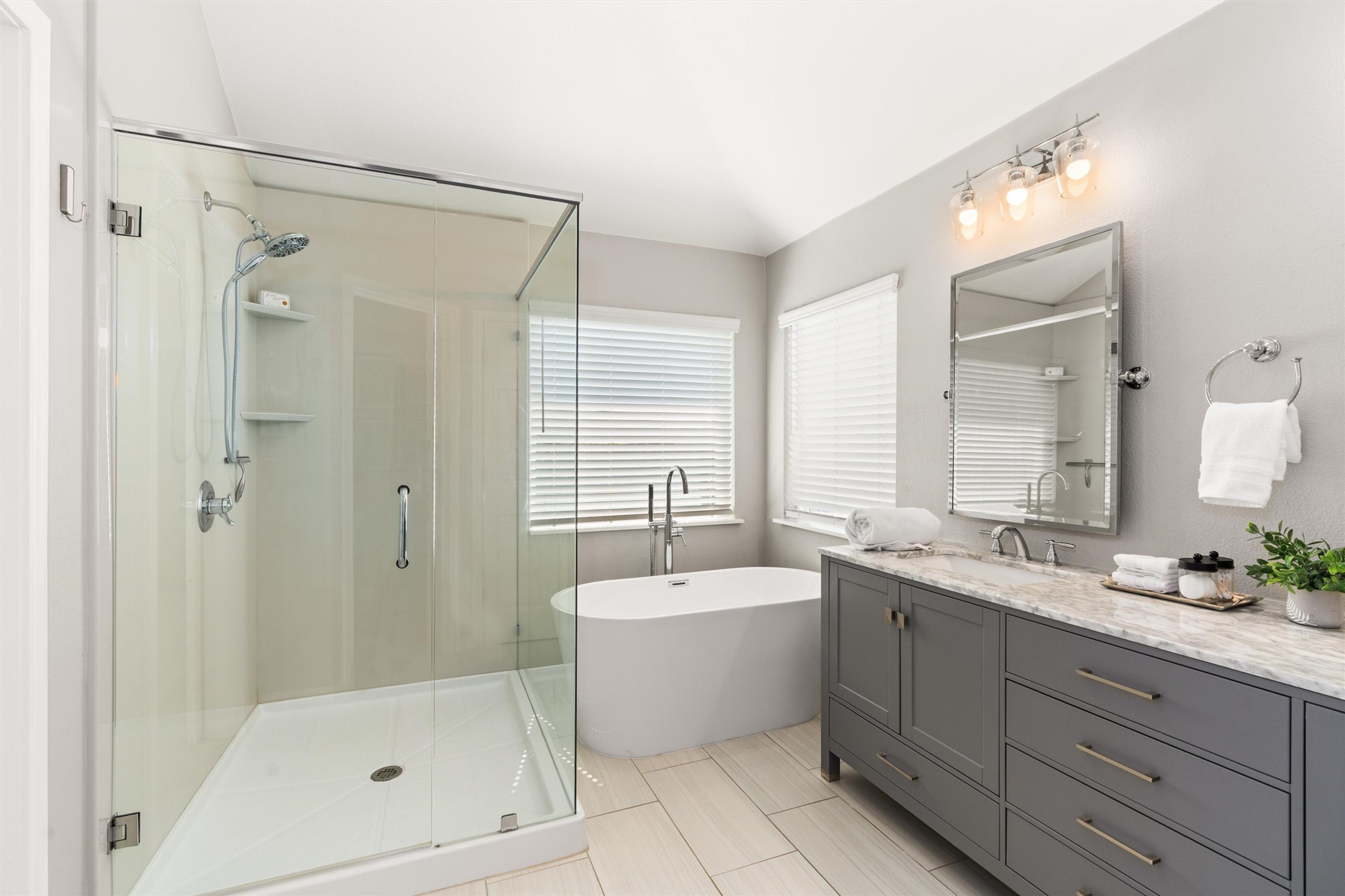 129 Summers Green Georgetown, TX 78633 - Photo 20 of 30 a bathroom with a bathtub shower sink vanity and toilet