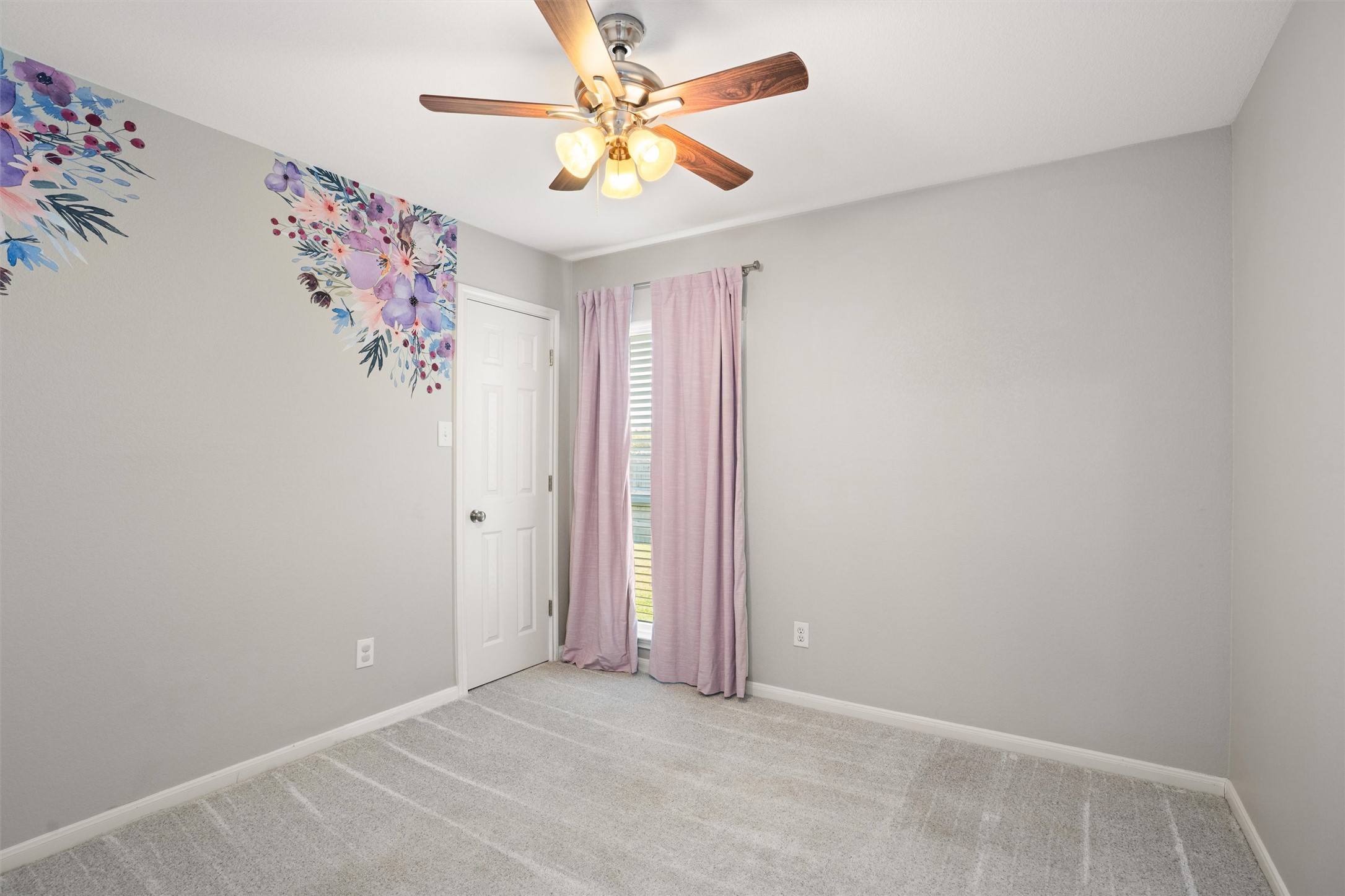 129 Summers Green Georgetown, TX 78633 - Photo 21 of 30 an empty room with a window and a fan