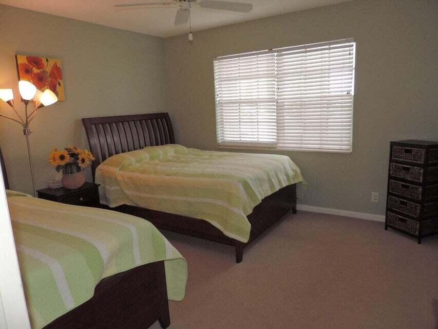 20 Celestial Way, Unit 105 Juno Beach, FL 33408 - Photo 5 of 7 Guest Bedroom