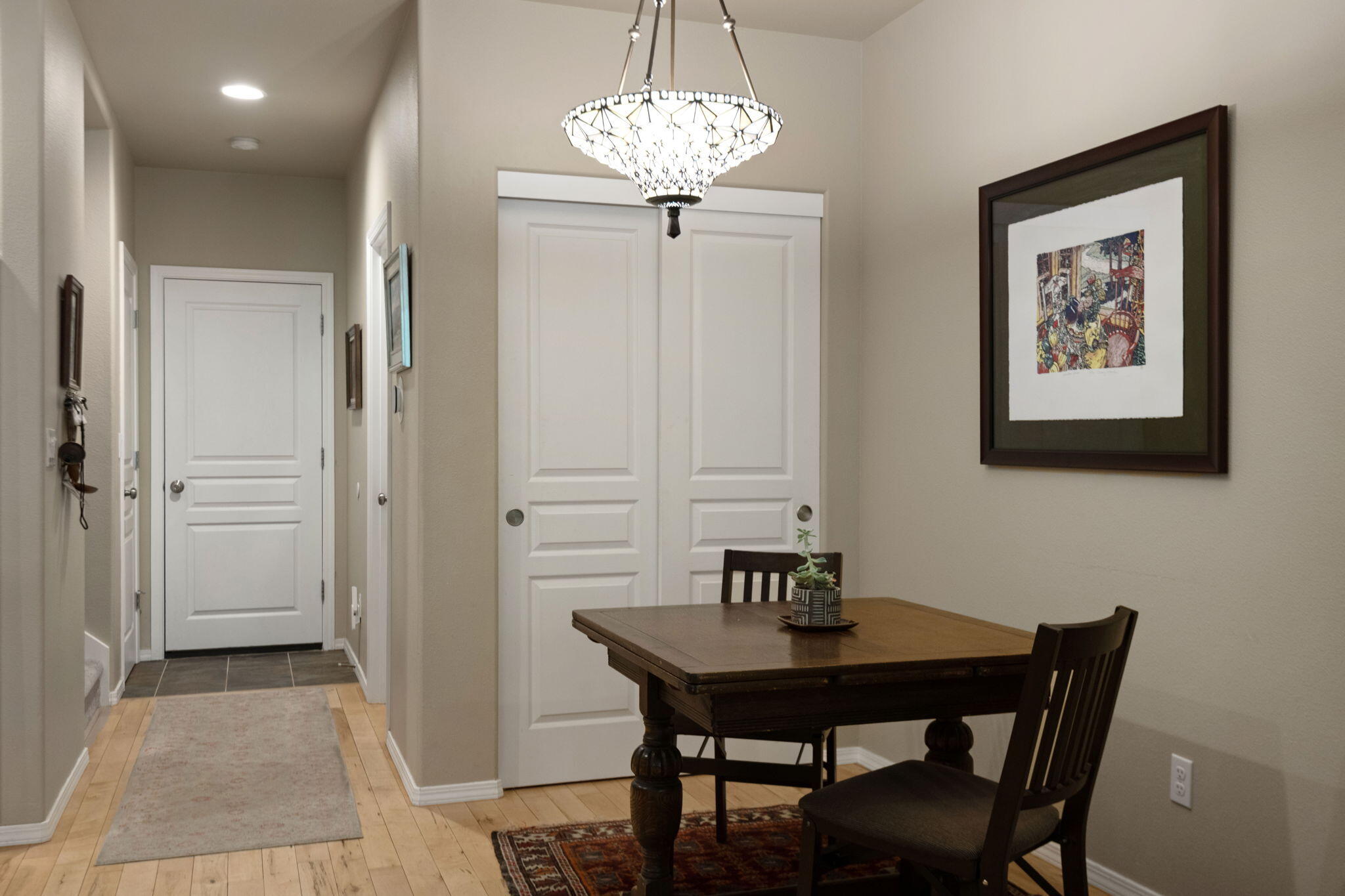 720 North Hindeman Street Sisters, OR 97759 - Photo 7 of 25 a view of a dining room with furniture and wooden floor