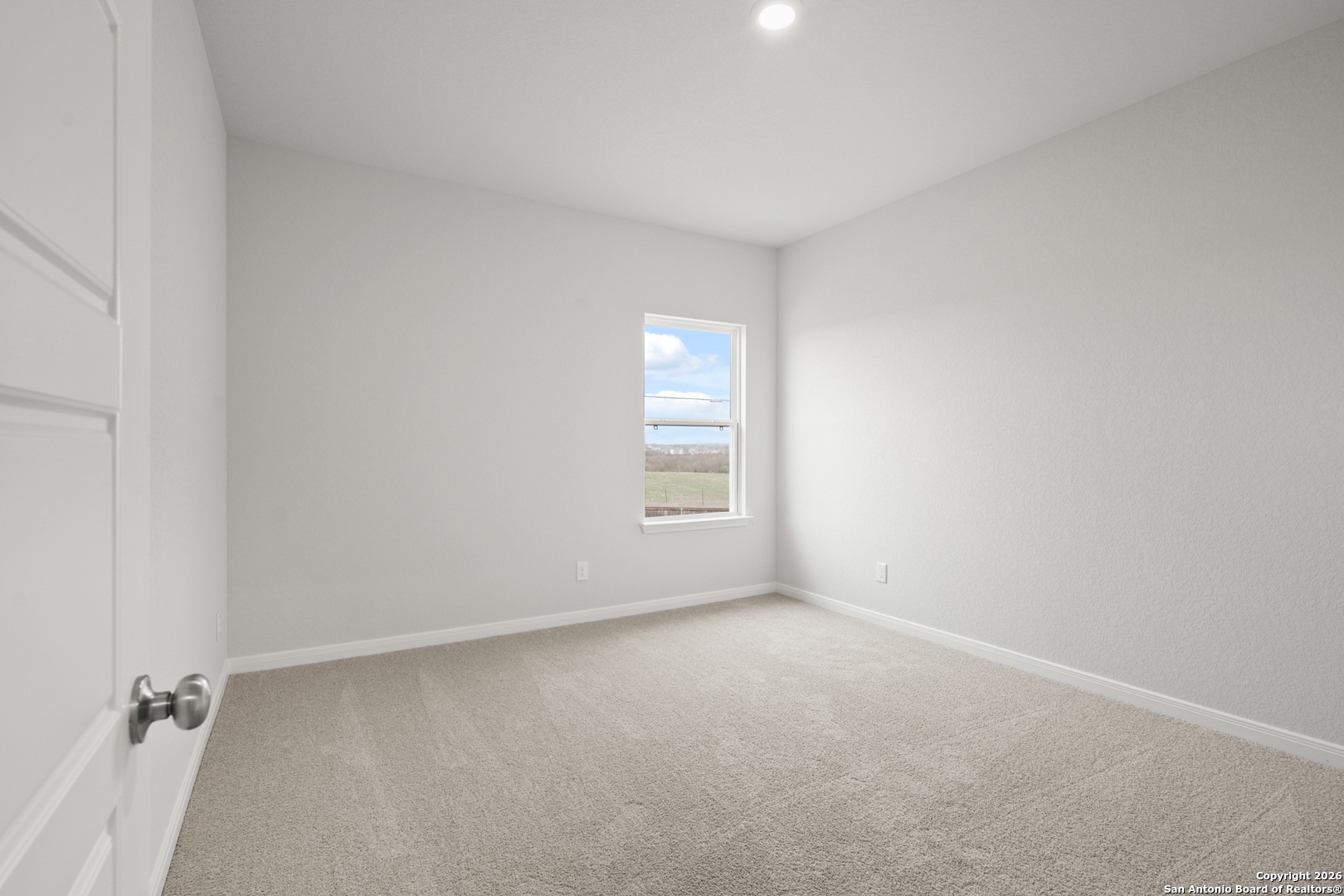3215 Katzer Lane Converse, TX 78109 - Photo 12 of 23 a view of an empty room with a window