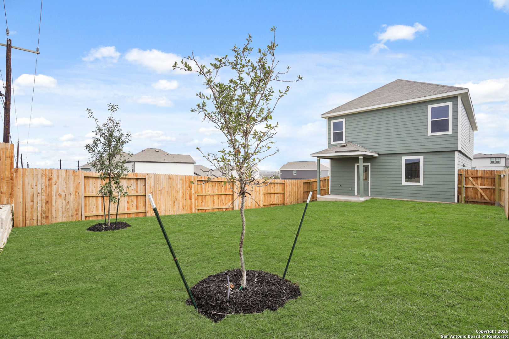 3215 Katzer Lane Converse, TX 78109 - Photo 21 of 23 a view of a backyard with a garden