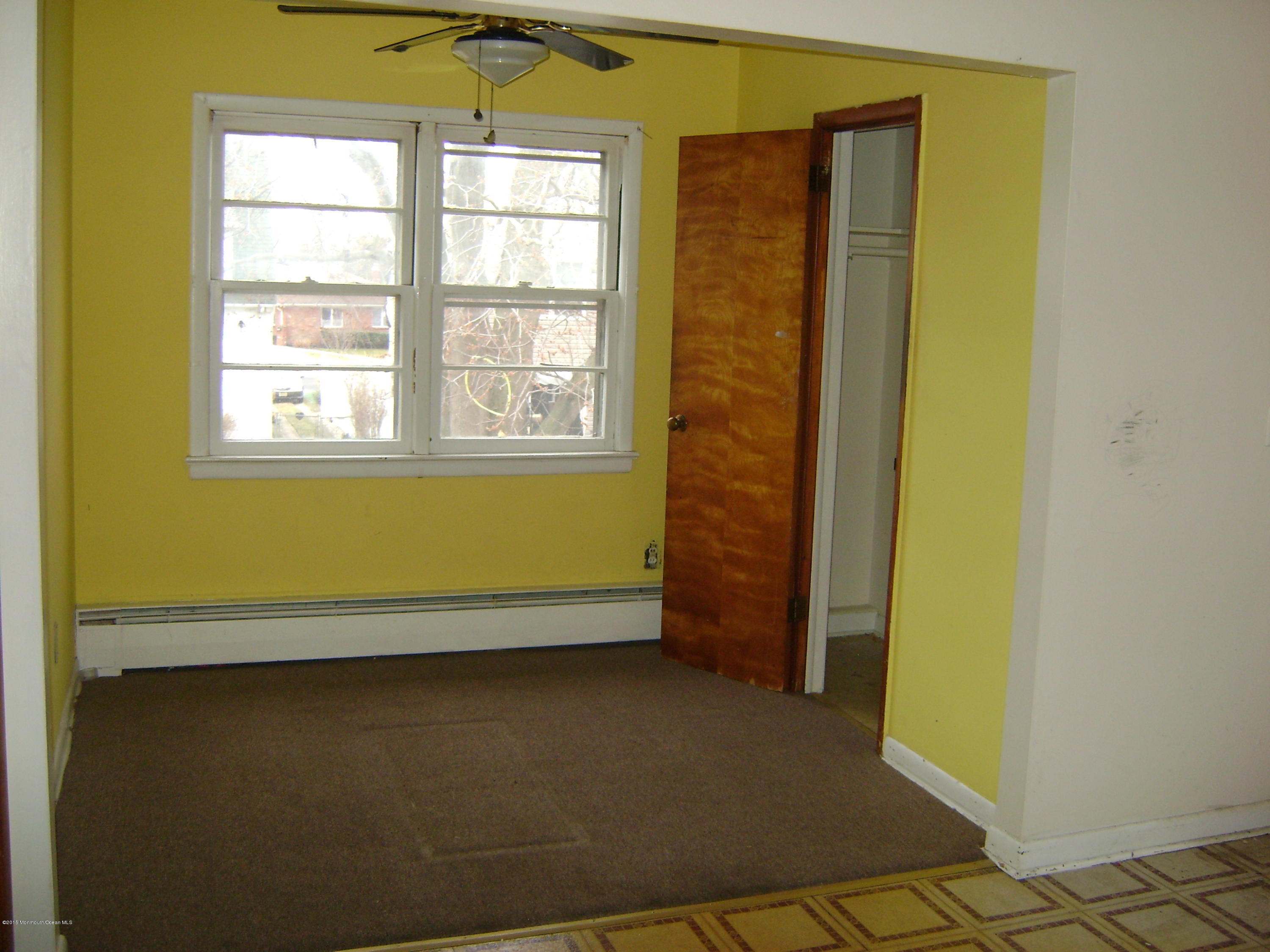 9 Howland Avenue Long Branch, NJ 07740 - Photo 9 of 11 an empty room with windows