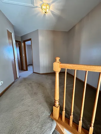 a view of a livingroom with a staircase