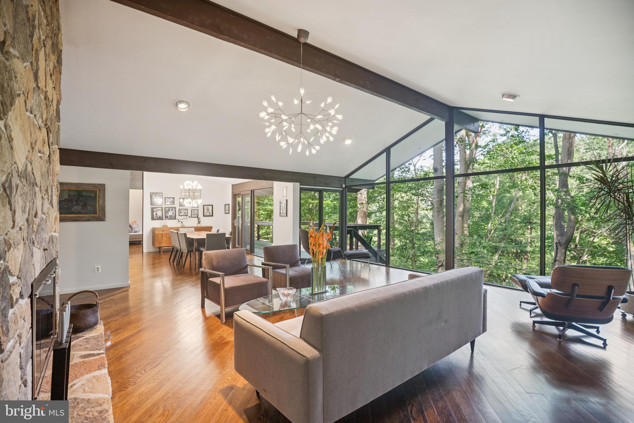 27 Forest View Road Rose Valley, PA 19086 - Photo 15 of 39 a living room with furniture large windows and wooden floor