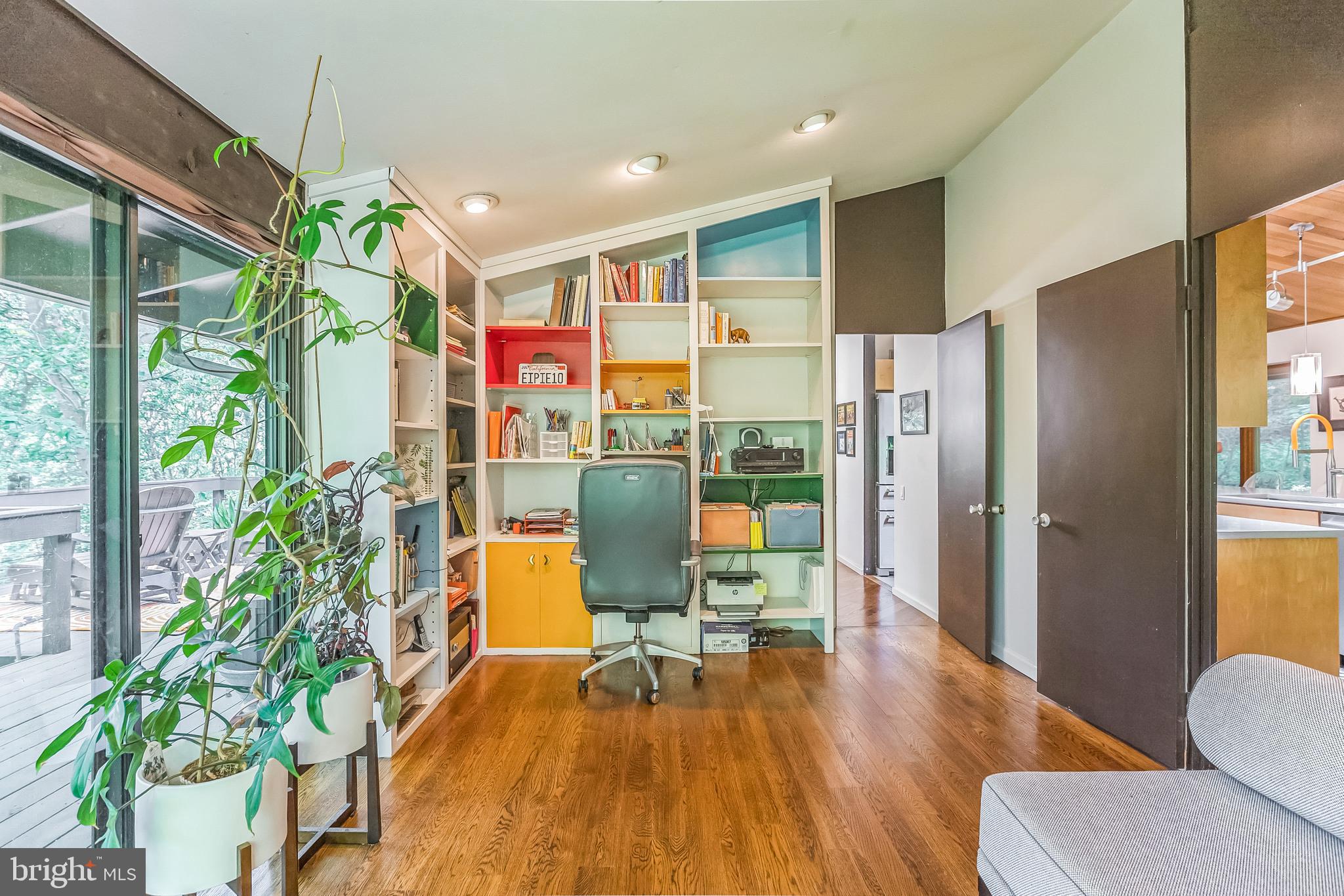 27 Forest View Road Rose Valley, PA 19086 - Photo 21 of 39 a living room with dining room and wooden floor