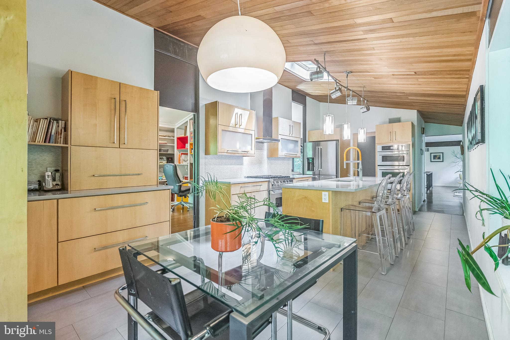 27 Forest View Road Rose Valley, PA 19086 - Photo 23 of 39 a kitchen with a table and chairs