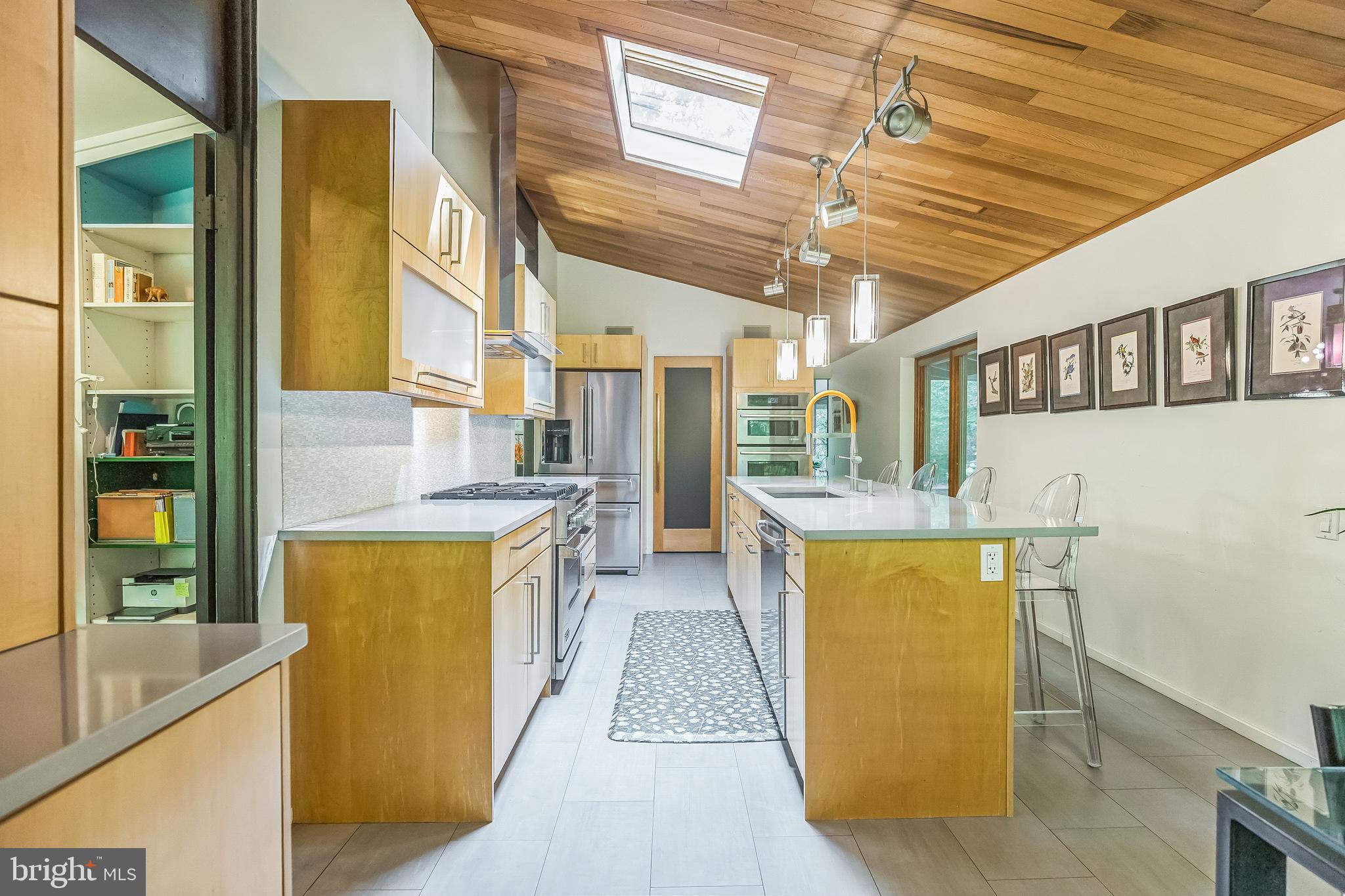 27 Forest View Road Rose Valley, PA 19086 - Photo 24 of 39 a kitchen with sink and refrigerator