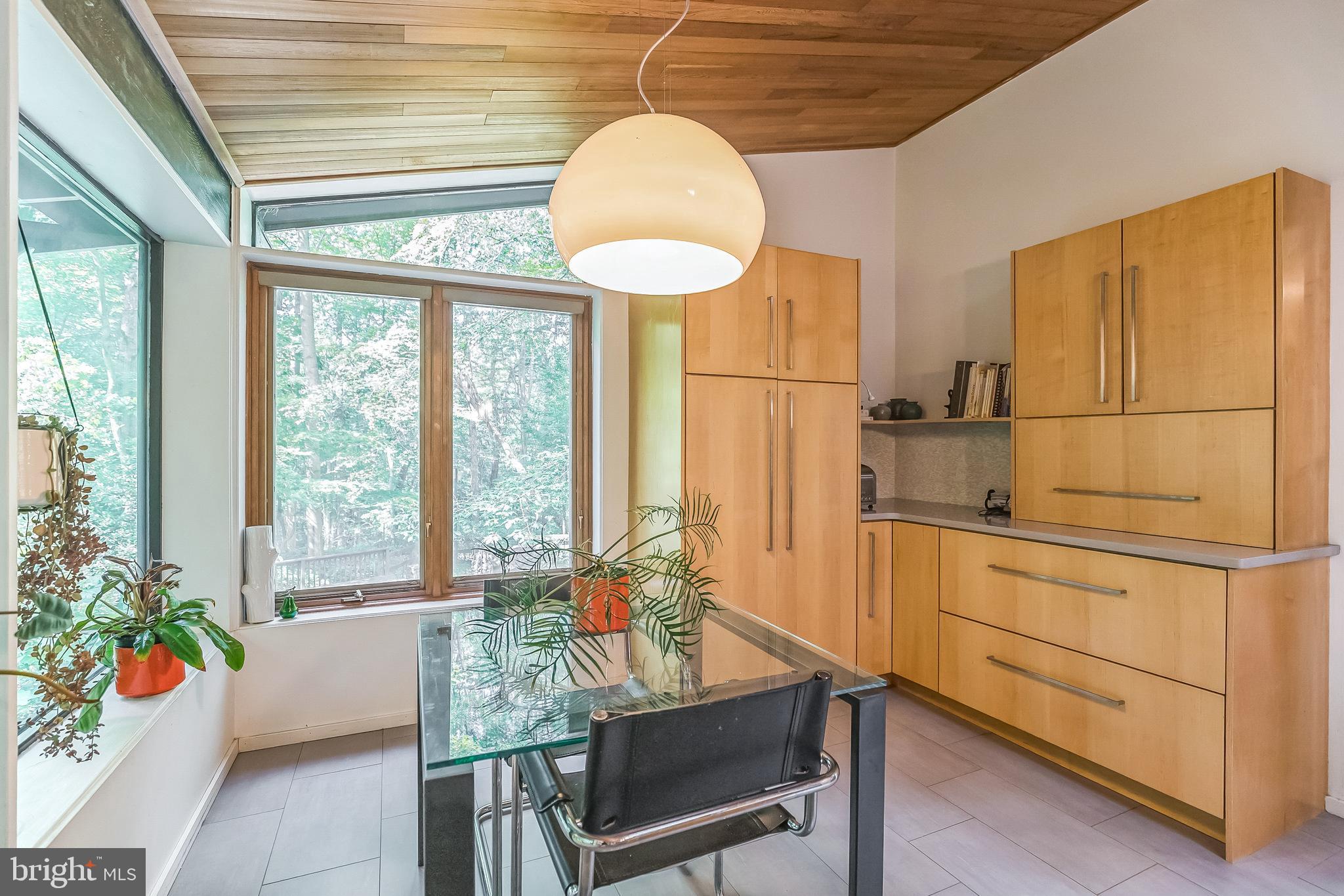 27 Forest View Road Rose Valley, PA 19086 - Photo 27 of 39 a living room with furniture and a table