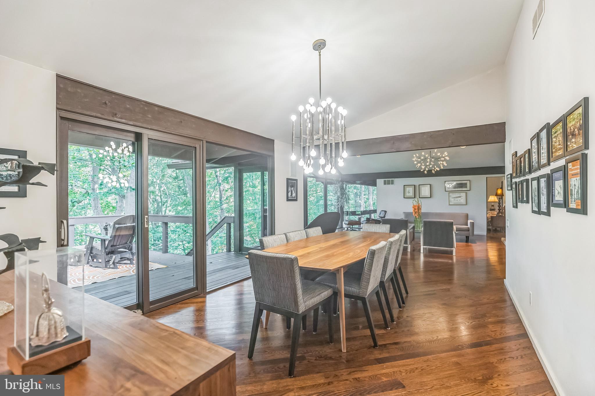 27 Forest View Road Rose Valley, PA 19086 - Photo 31 of 39 a view of a dining room with furniture window and wooden floor