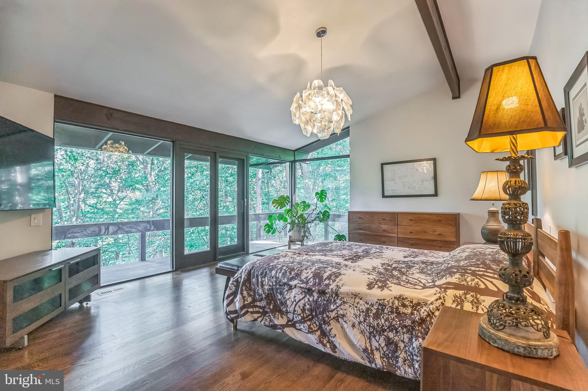 27 Forest View Road Rose Valley, PA 19086 - Photo 33 of 39 a bedroom with a bed and a window