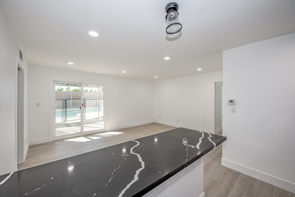 1069 Erringer Road Simi Valley, CA 93065 - Photo 6 of 24 a view of an empty room with a window