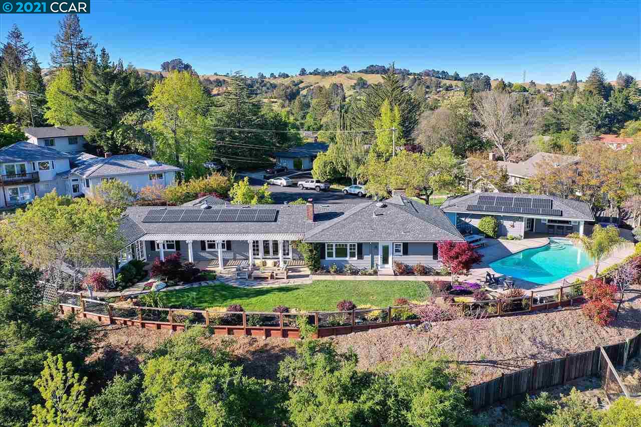 54 Fieldbrook Place Moraga, CA 94556 - Photo 1 of 1 an aerial view of a house with a garden and lake view