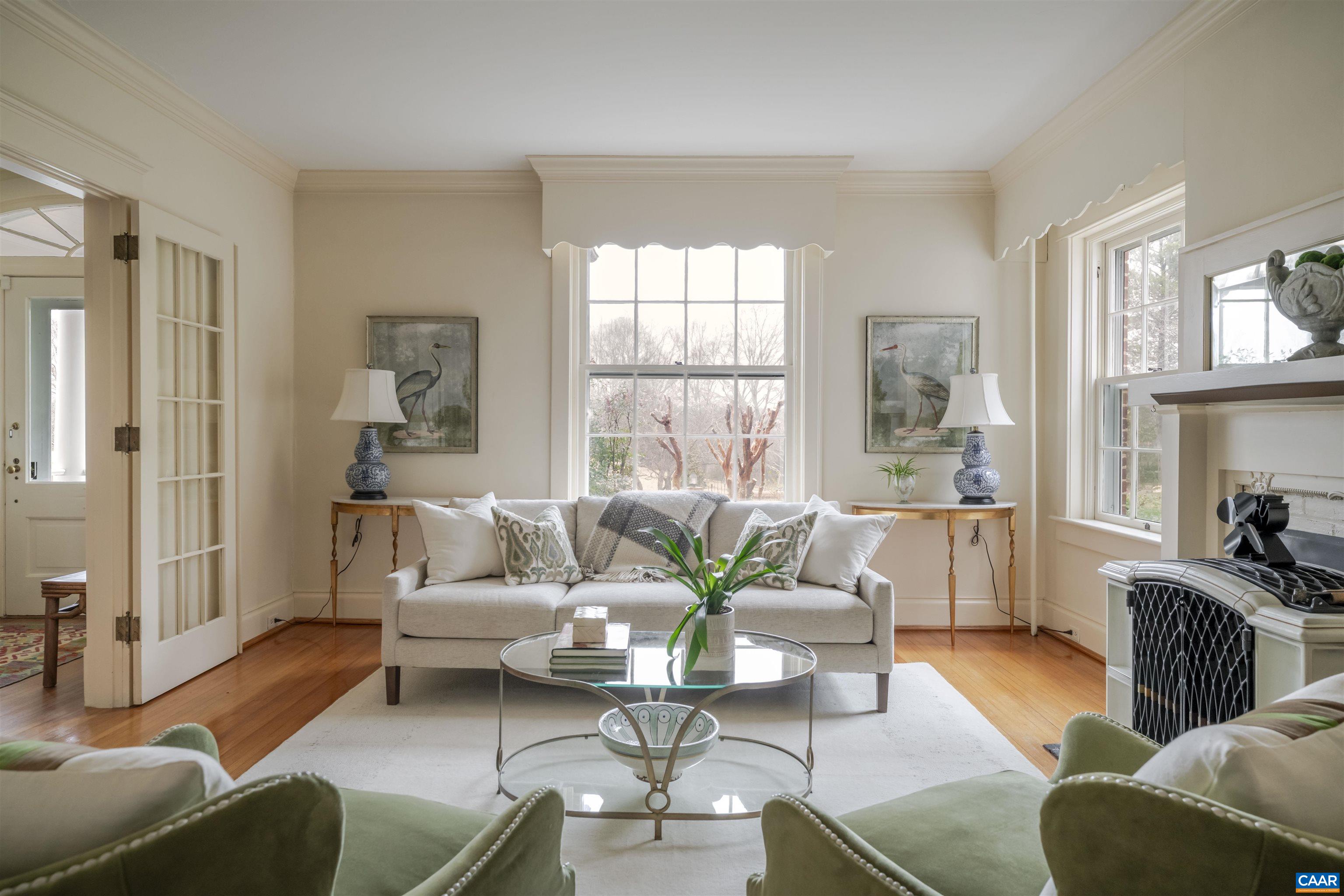 4035 Edge Valley Road North Garden, VA 22959 - Photo 13 of 57 a living room with furniture and a large window