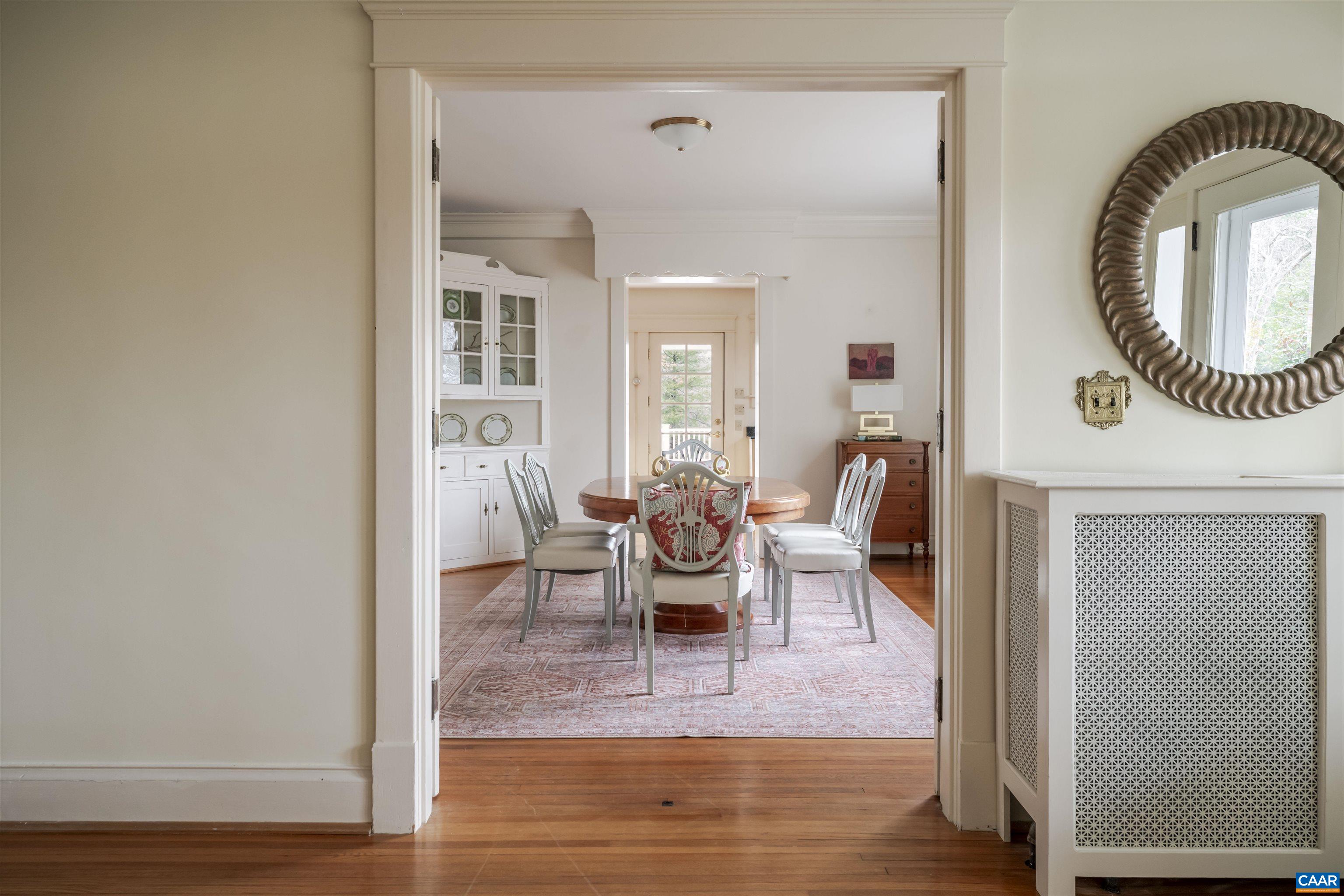 4035 Edge Valley Road North Garden, VA 22959 - Photo 14 of 57 a living room with furniture a window and a wooden floor