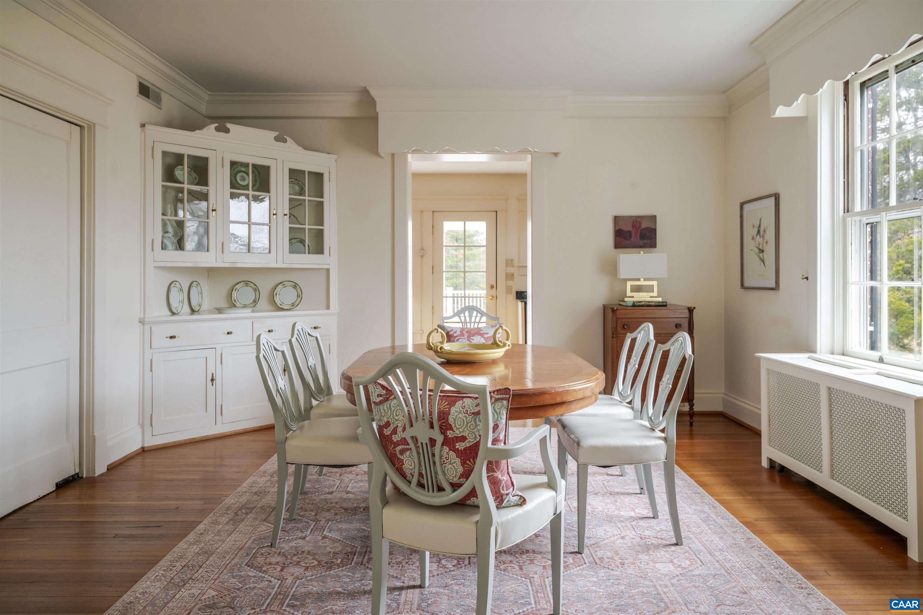 4035 Edge Valley Road North Garden, VA 22959 - Photo 15 of 57 a view of a dining room with furniture and windows