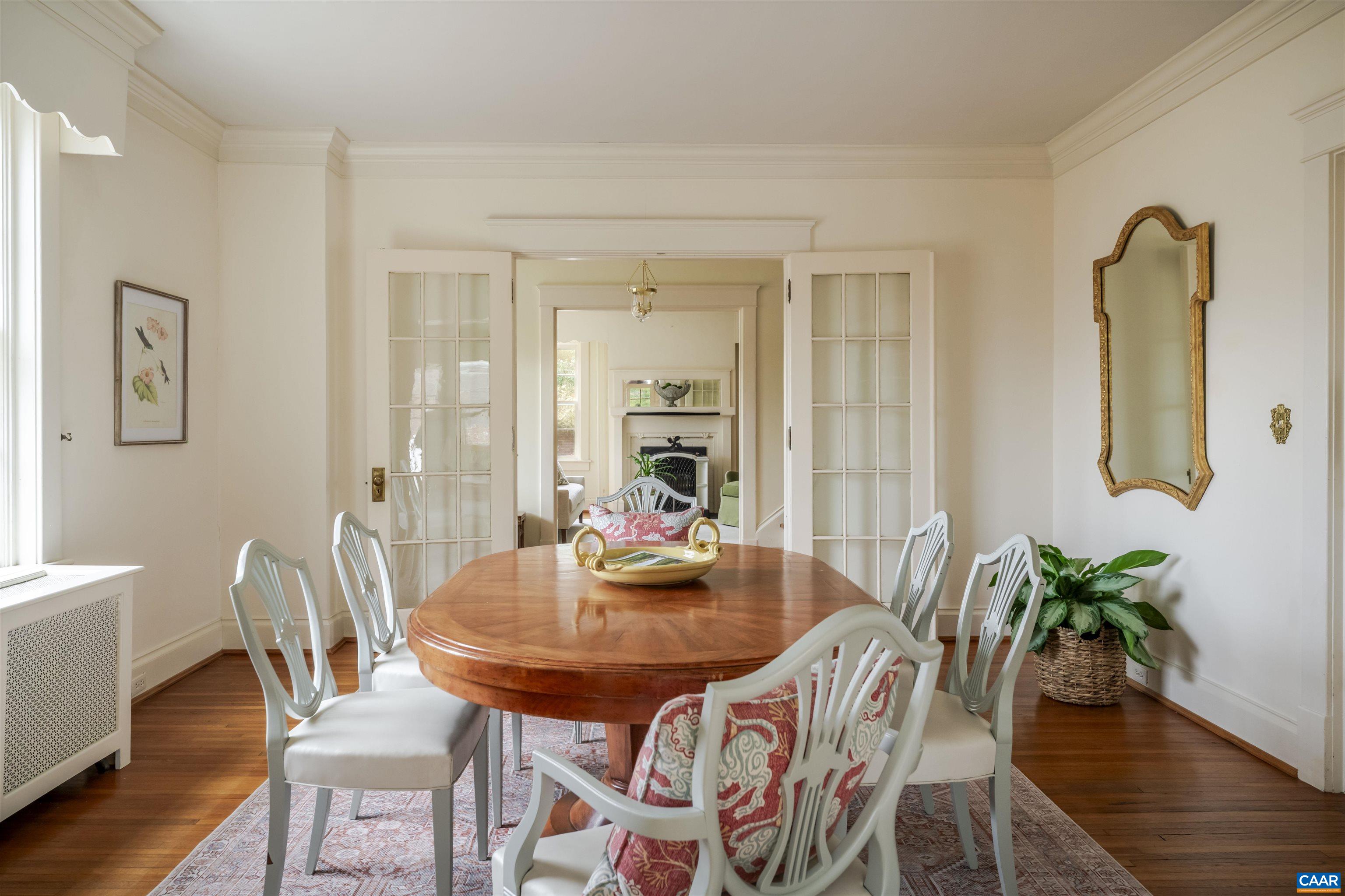 4035 Edge Valley Road North Garden, VA 22959 - Photo 17 of 57 a dining room with furniture and wooden floor