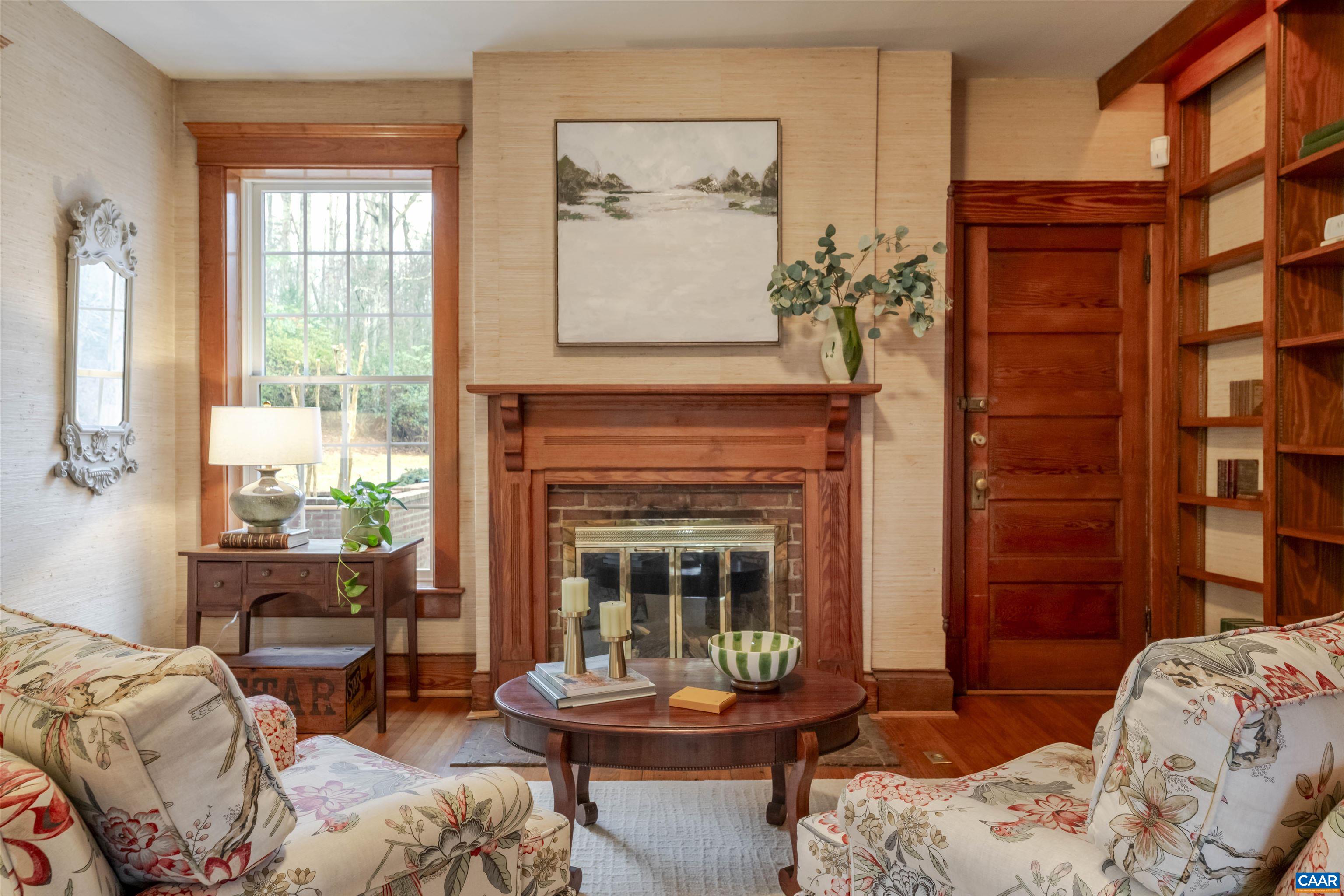 4035 Edge Valley Road North Garden, VA 22959 - Photo 20 of 57 a living room with furniture and a fireplace