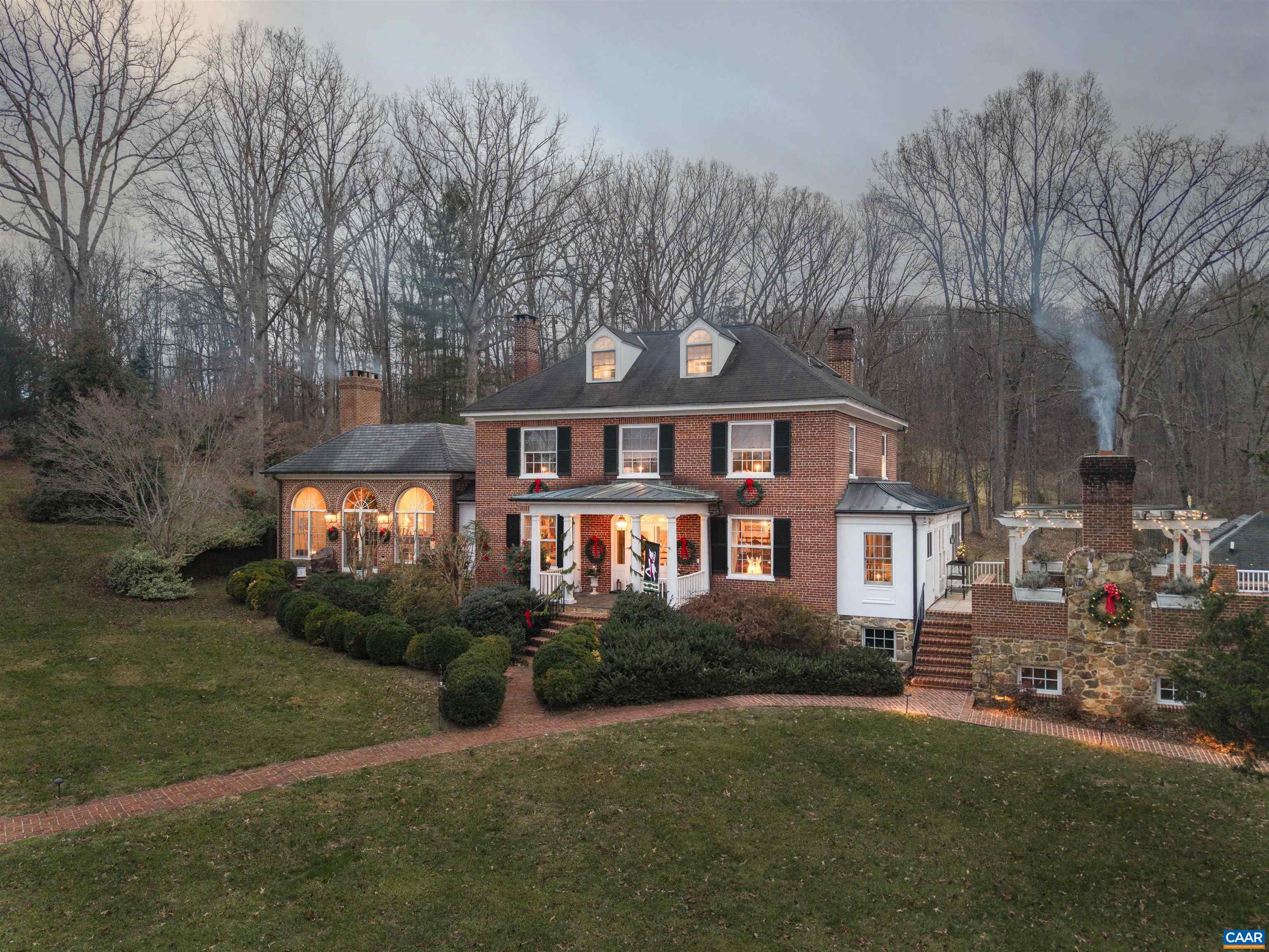 4035 Edge Valley Road North Garden, VA 22959 - Photo 2 of 57 a front view of a house with garden