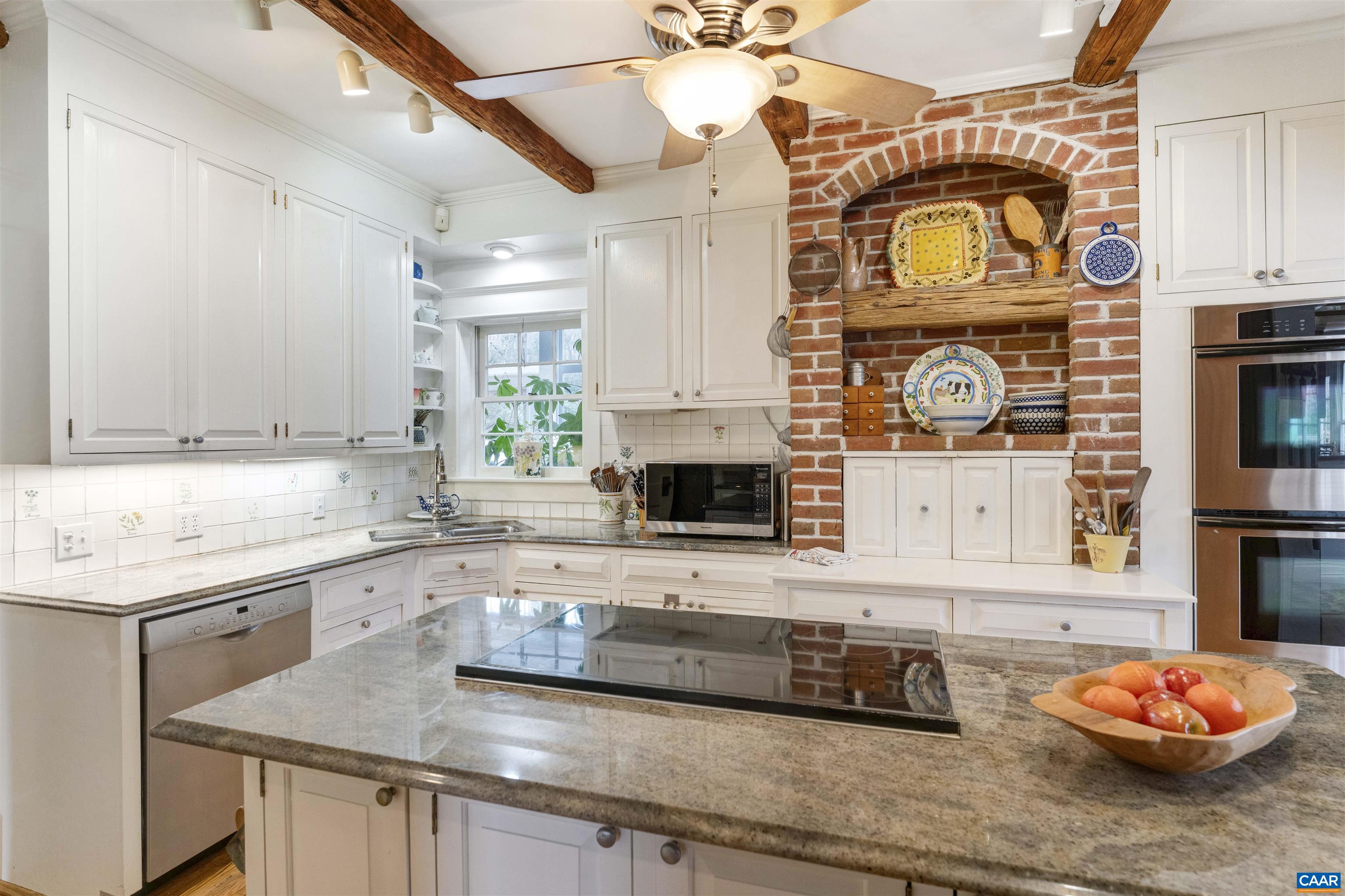 4035 Edge Valley Road North Garden, VA 22959 - Photo 28 of 57 a kitchen with a sink cabinets and a stove