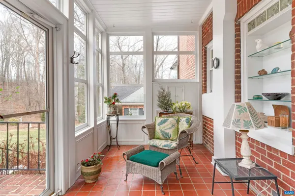 a bedroom with a bed and a table