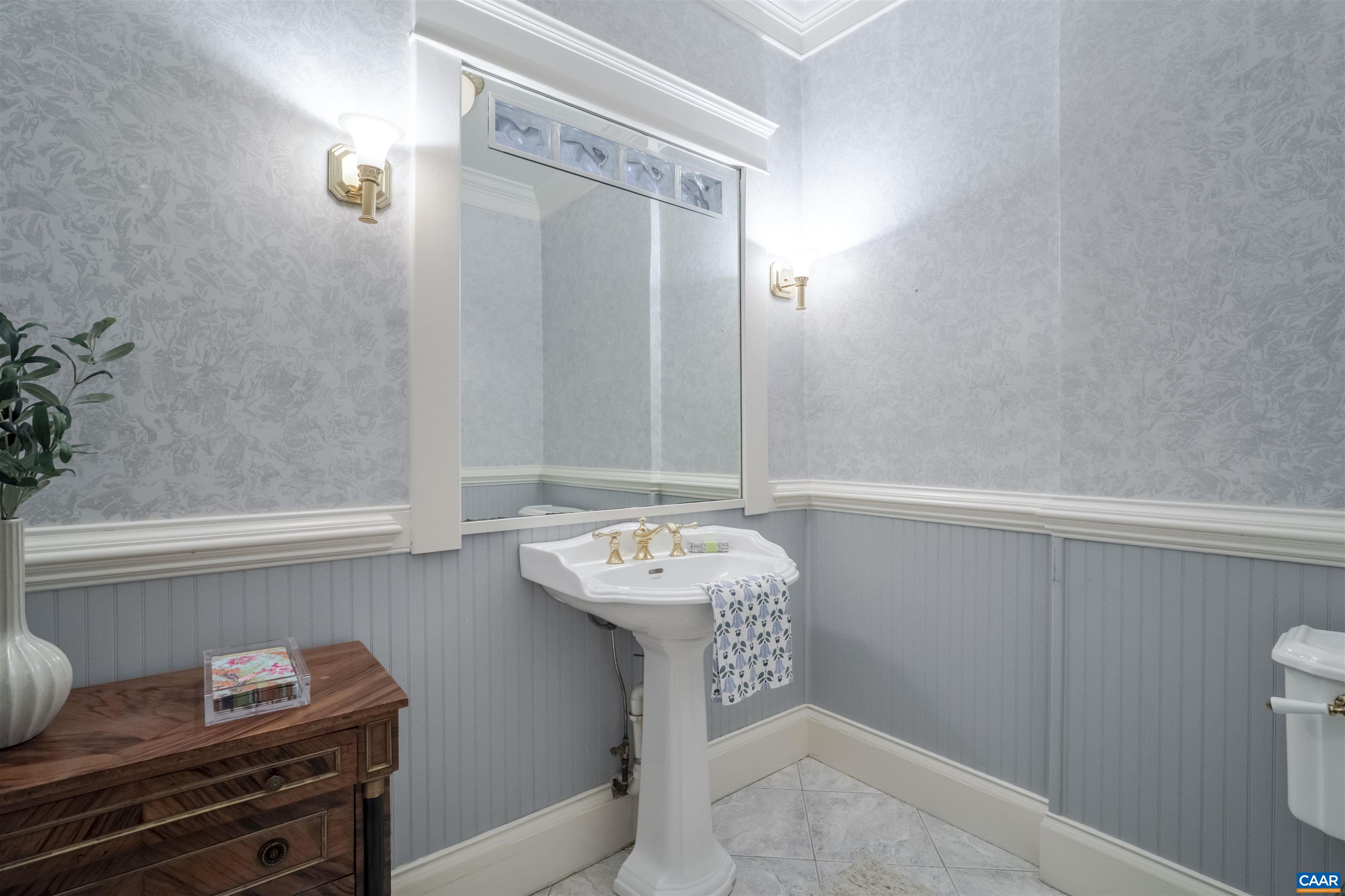 4035 Edge Valley Road North Garden, VA 22959 - Photo 33 of 57 a bathroom with a sink and a mirror