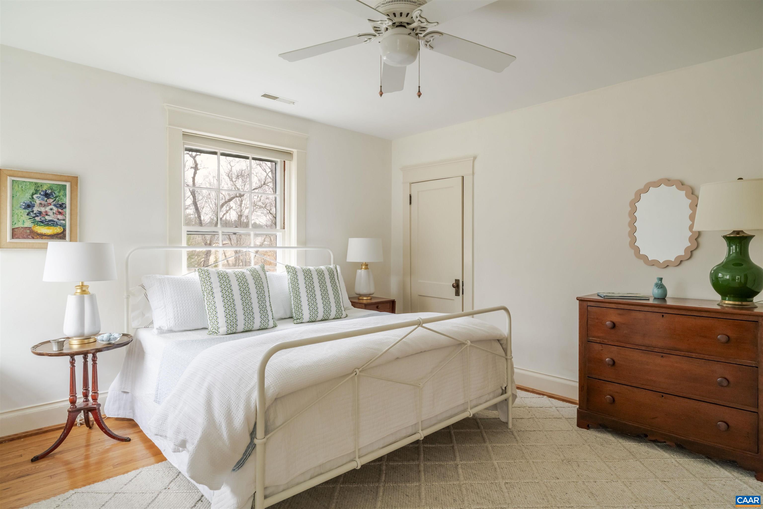 4035 Edge Valley Road North Garden, VA 22959 - Photo 37 of 57 a bedroom with a bed and a dresser