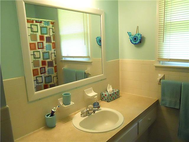 110 Cardinal Road Dickson, TN 37055 - Photo 14 of 20 a bathroom with a sink and a mirror