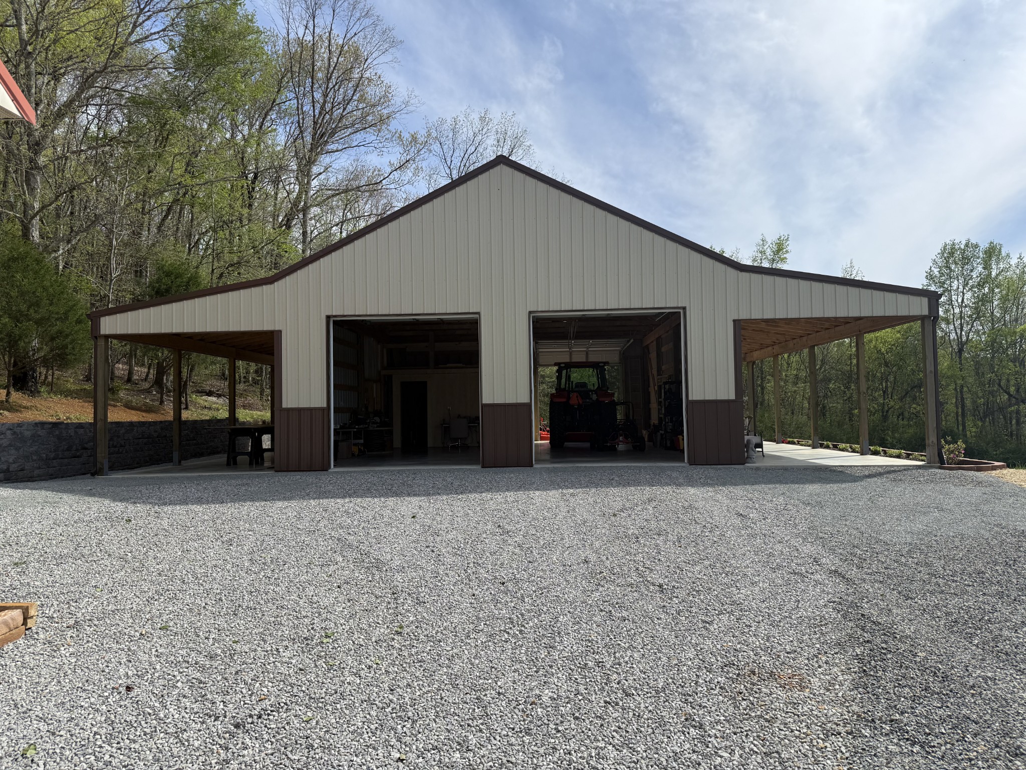 109 Rascal Town Road Loretto, TN 38469 - Photo 25 of 43 a front view of a house with a yard and garage